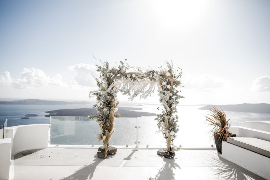 Ceremony altar with a view after reading how to elope in Greece
