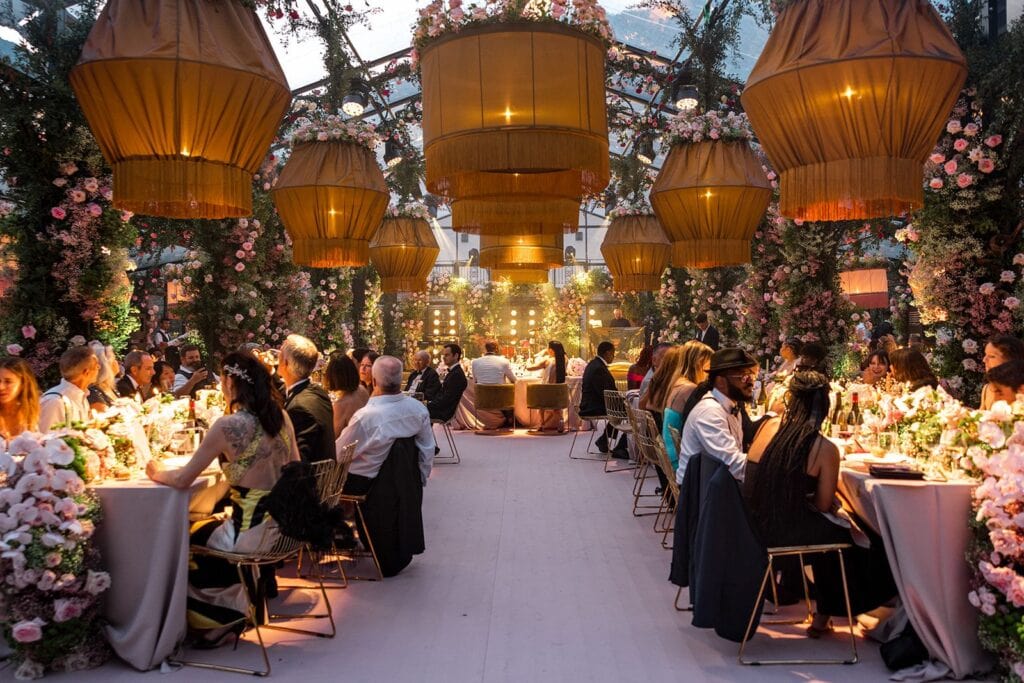 Wedding reception dinner in greenhouse venue