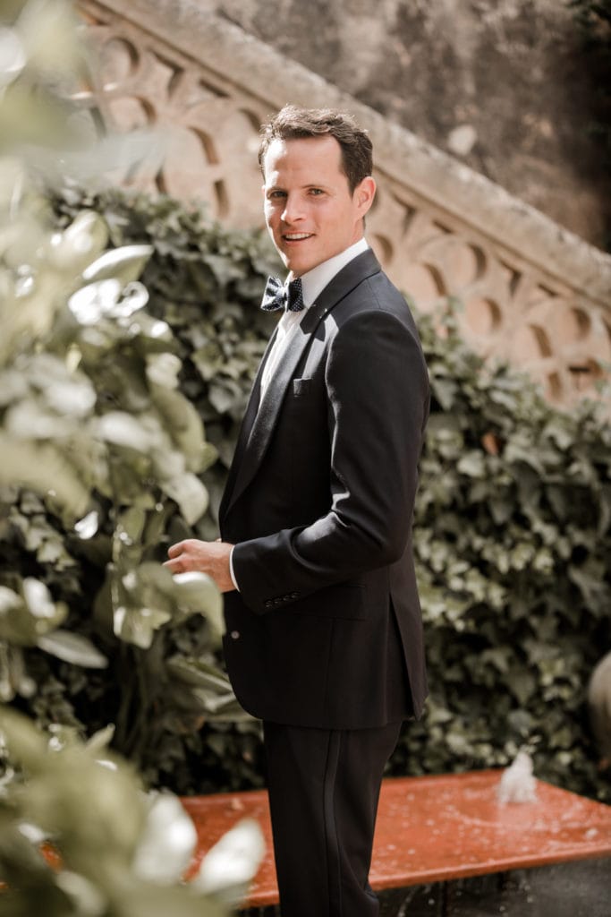 Groom waits for bride for first look at Finca son Mir Mallorca, Spain
