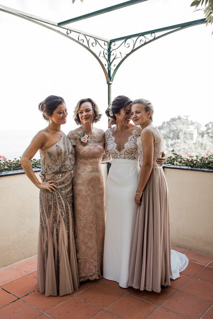 Bride and bridesmaids on balcony of Belmond Splendido in Cinque Terre