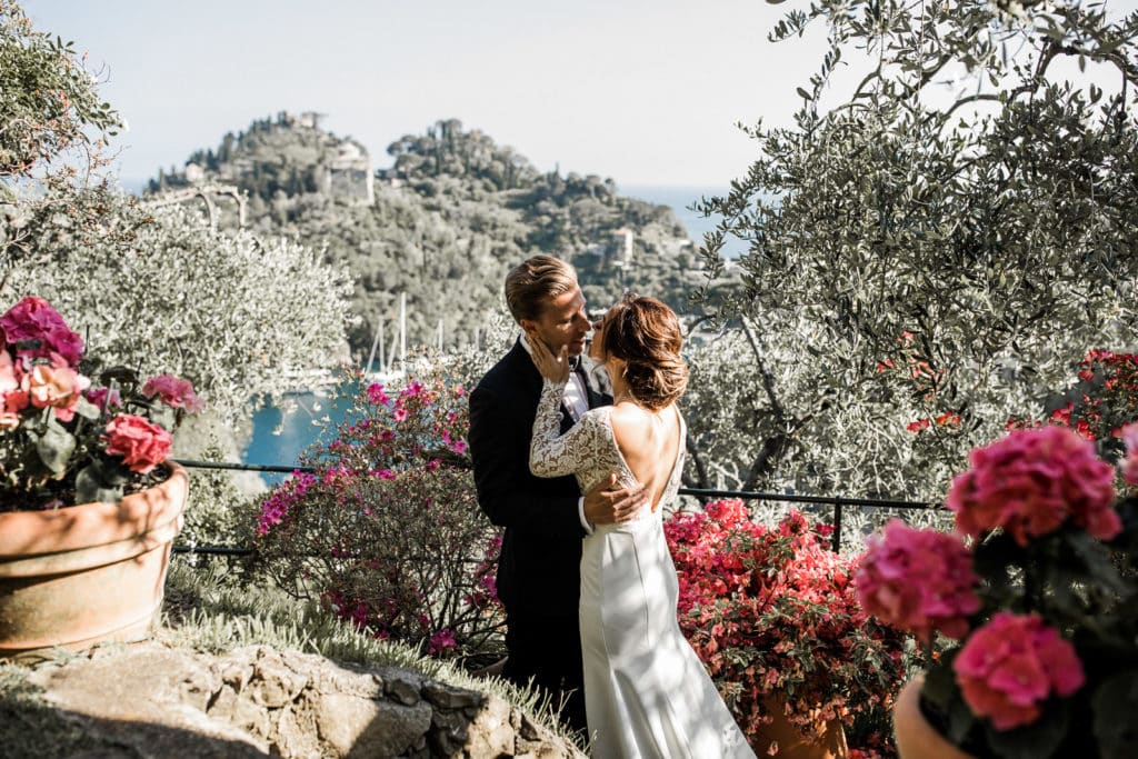 Bride and groom kiss after Portofino hotel wedding