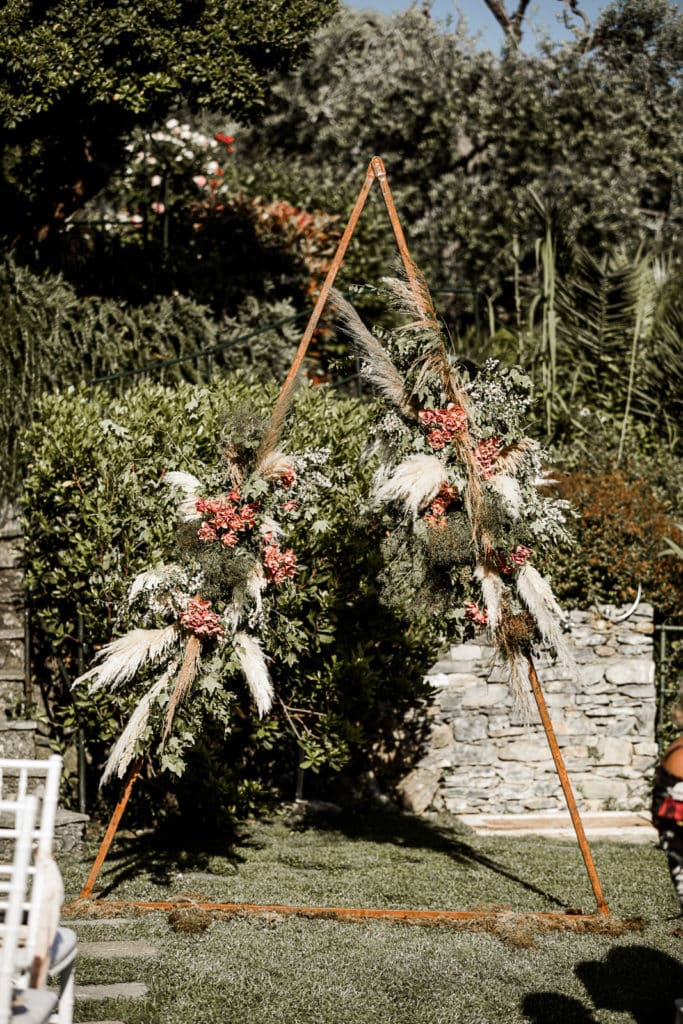 Triangle ceremony altar for outdoor Portofino wedding ceremony site