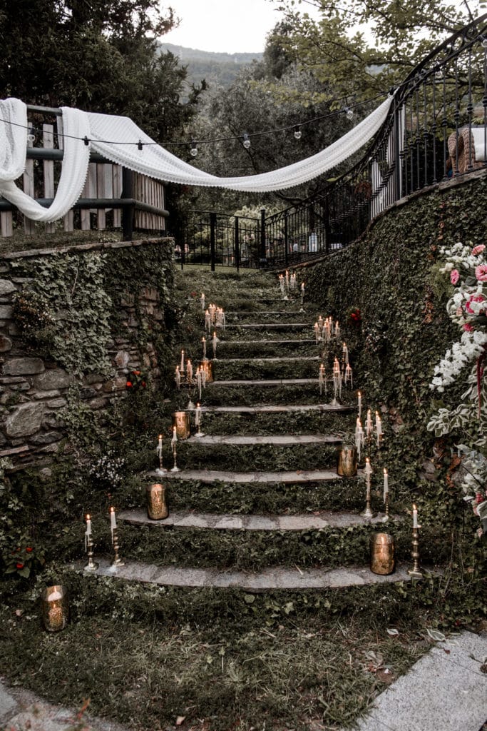 Fairytale candles line stone steps for romantic lighting at Villa Camilla, Lake Como