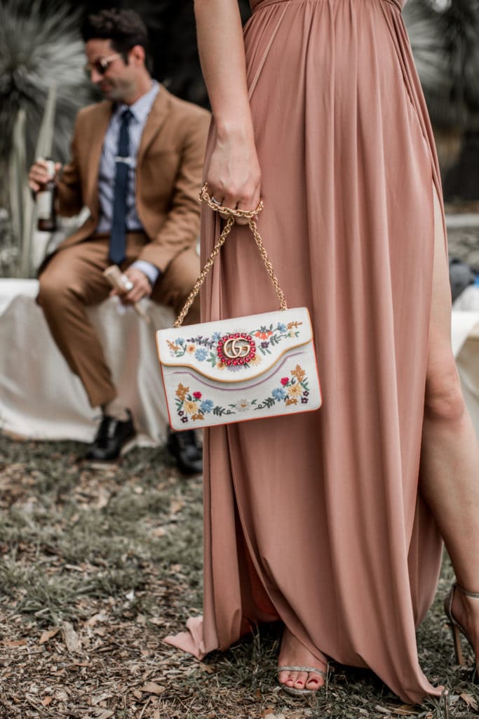 Wedding guest carried designer handbag