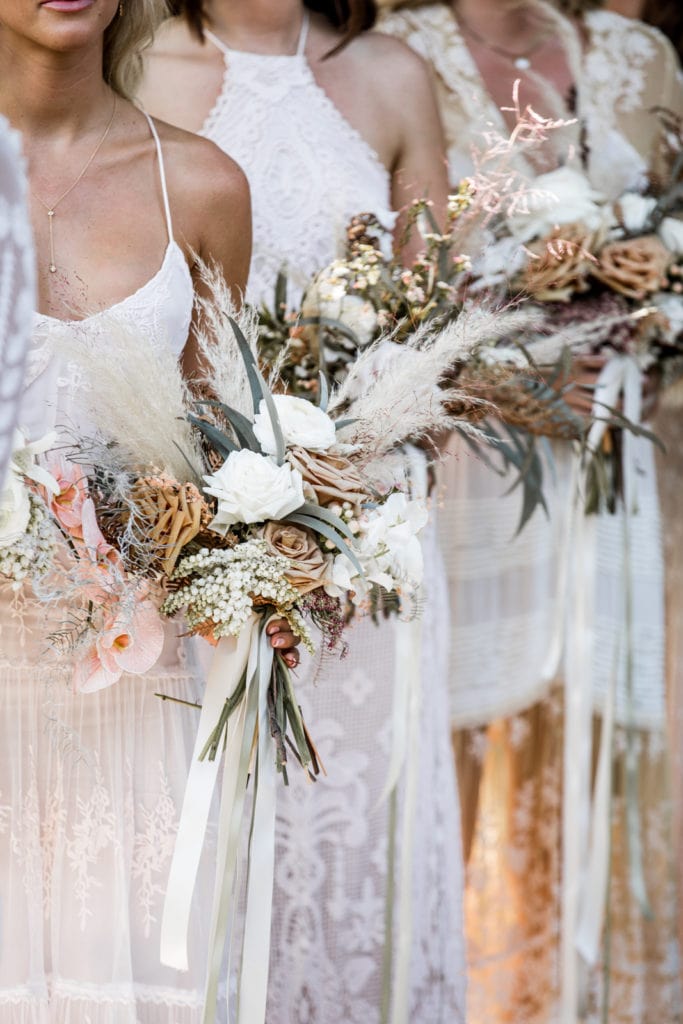 Bridesmaids hold bouquets during destination Australia wedding
