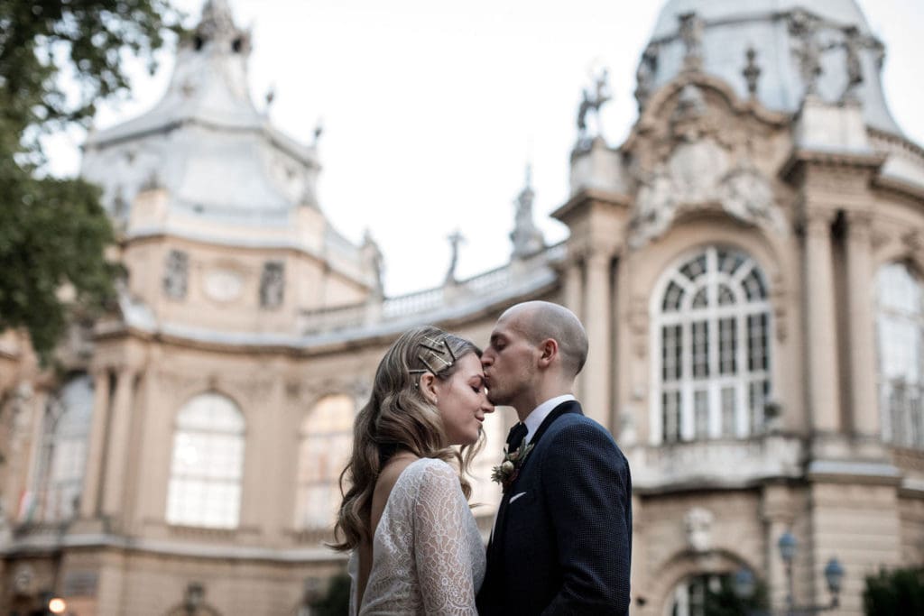 Groom kisses bride in Budapest, Hungary