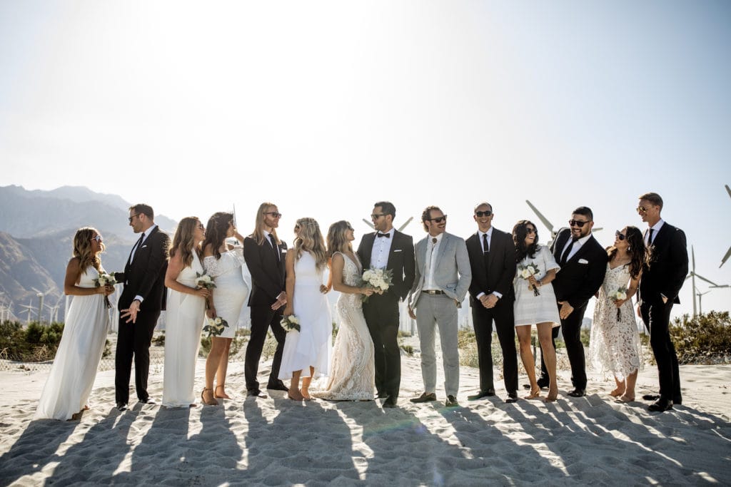 Bride and groom with bridal party portrait in Palm Springs desert