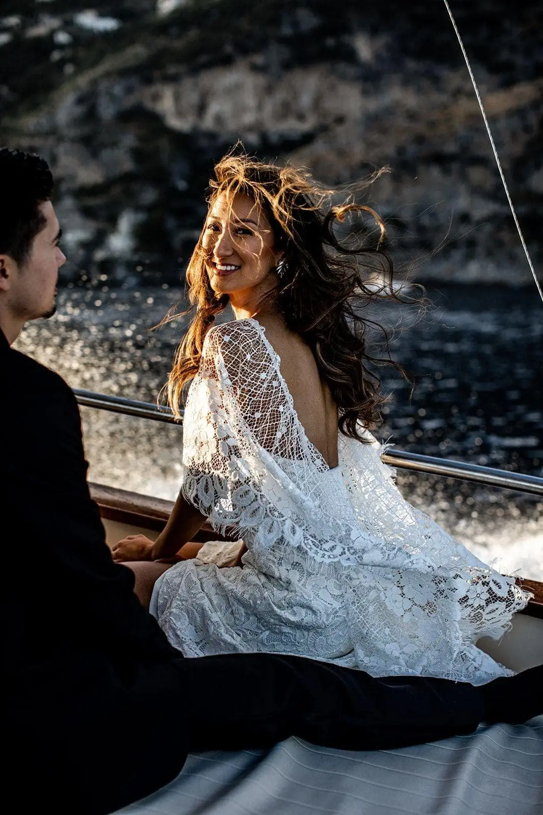 Sunset boat portraits with married couple in Positano Italy