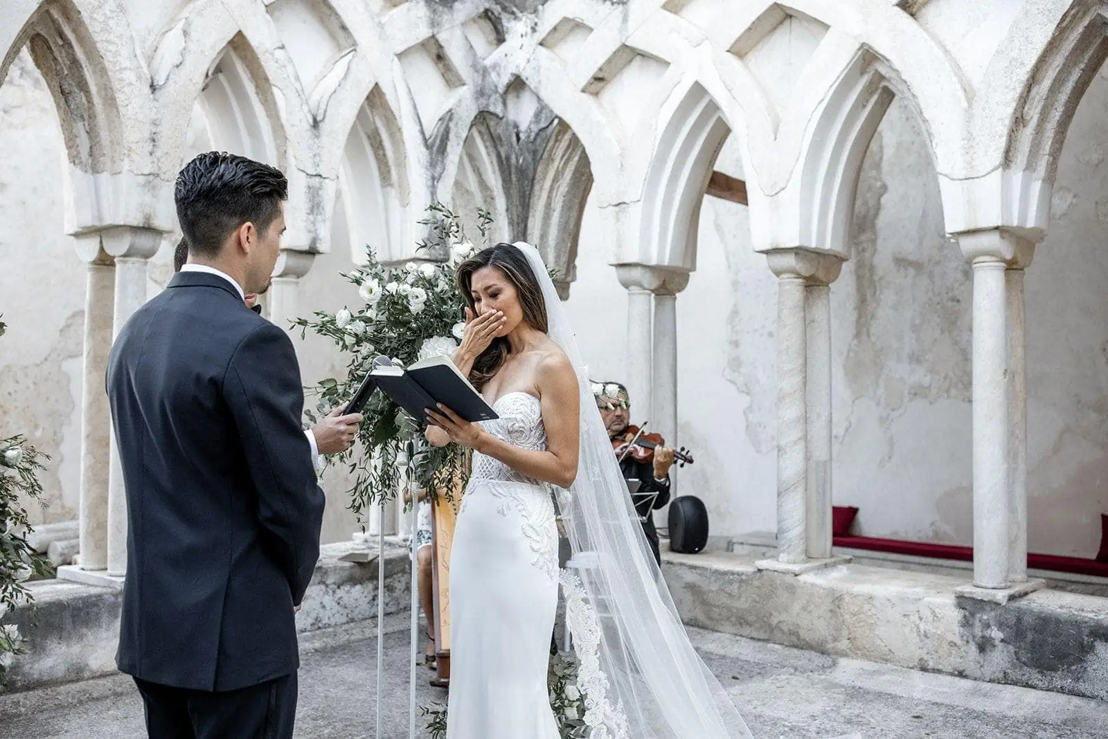 Bride gets emotional during wedding ceremony at Grand Hotel Convento