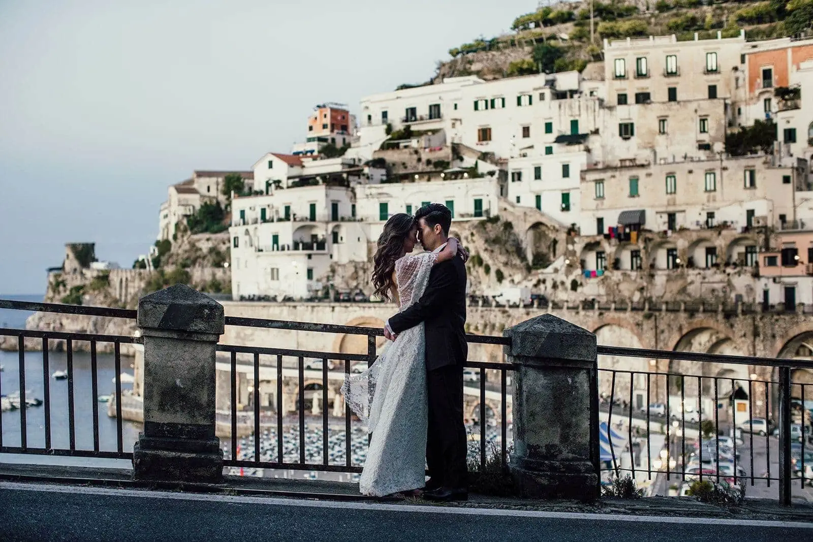 Newly married couple embrace during sunrise portraits in Atrani Italy