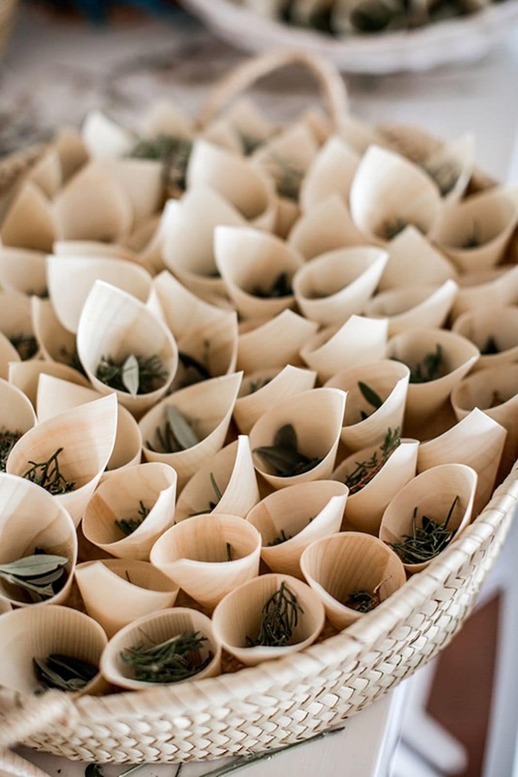 Wedding ceremony toss favors settled in a basket for guests to throw after ceremony. 