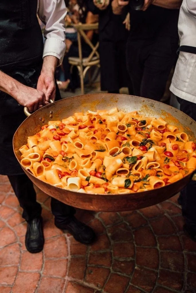 Large pan of authentic Italian pasta served at a wedding reception