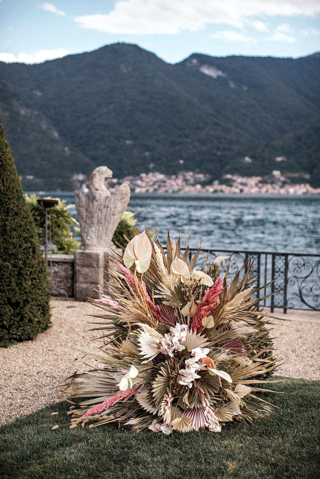 Tropical flower arrangement at Lake Como ceremony site