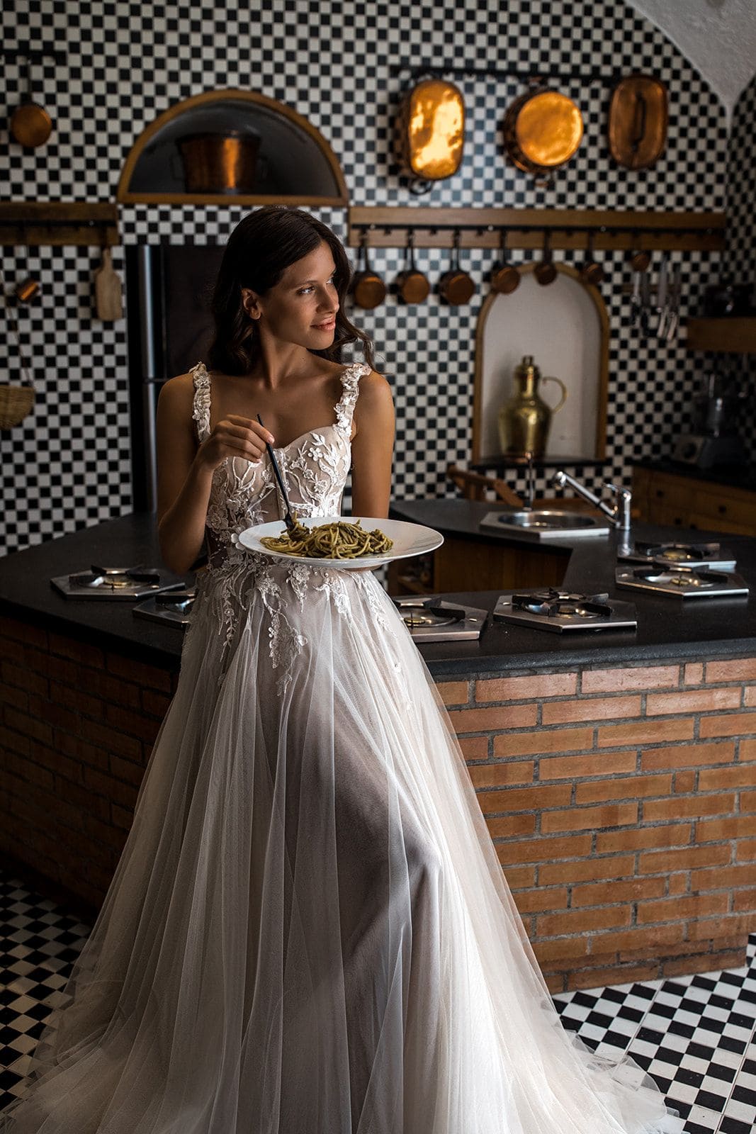 Bride wearing Berta wedding gown in Villa Astor kitchen