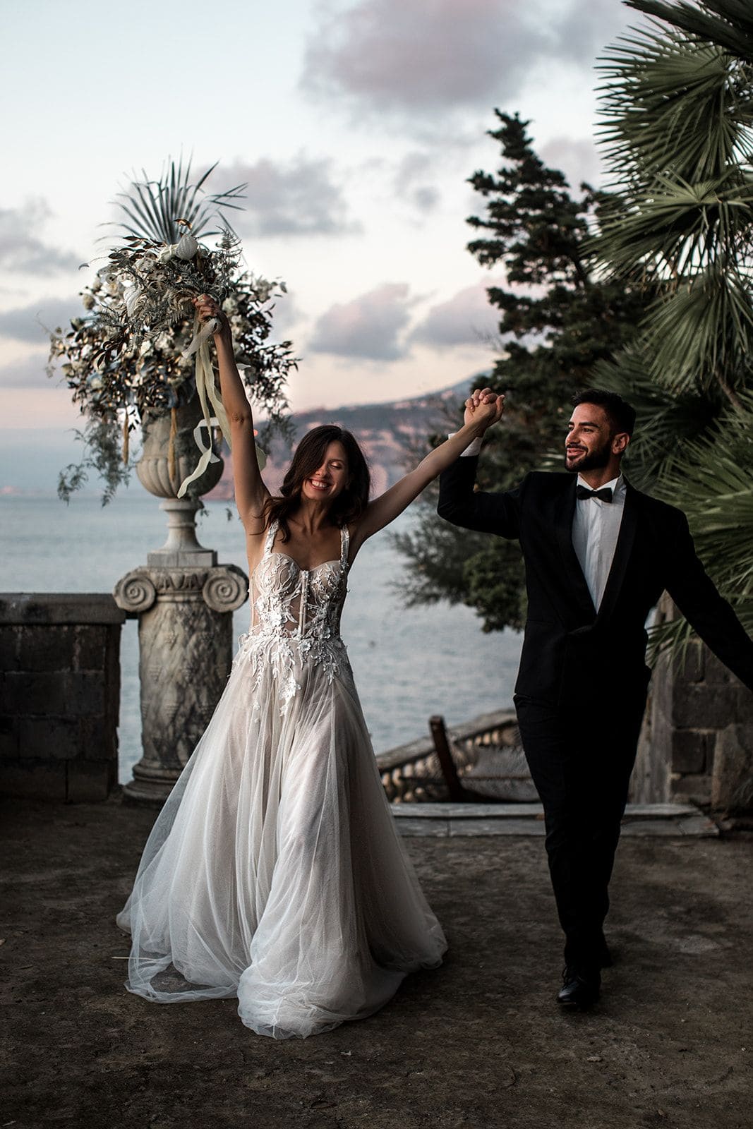 Bride and groom celebrate after Amalfi Coast elopement