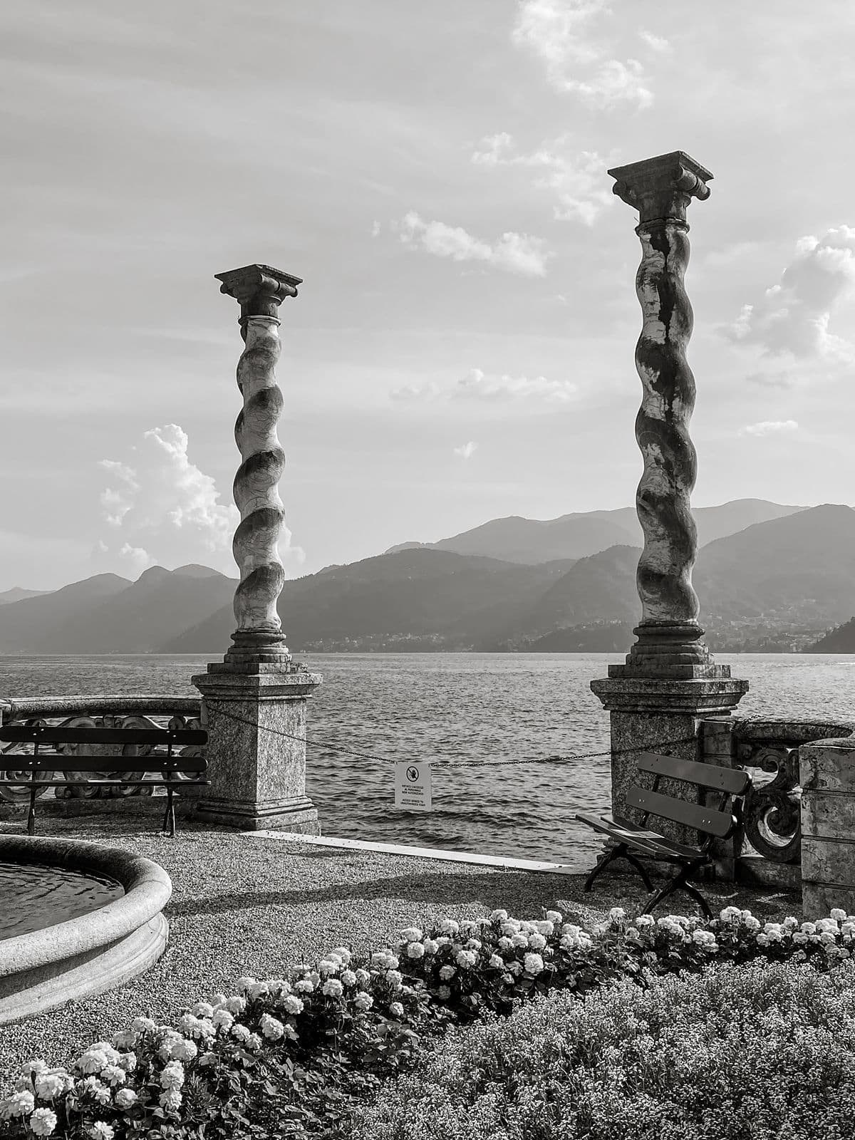 Villa Monastero pillars at water's edge in Lake Como