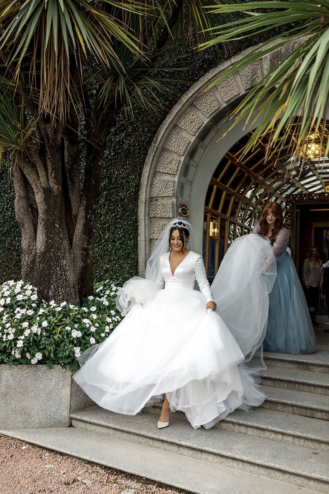 Bride walks outside of Grand Hotel Tremezzo one of the best Lake Como Wedding venues