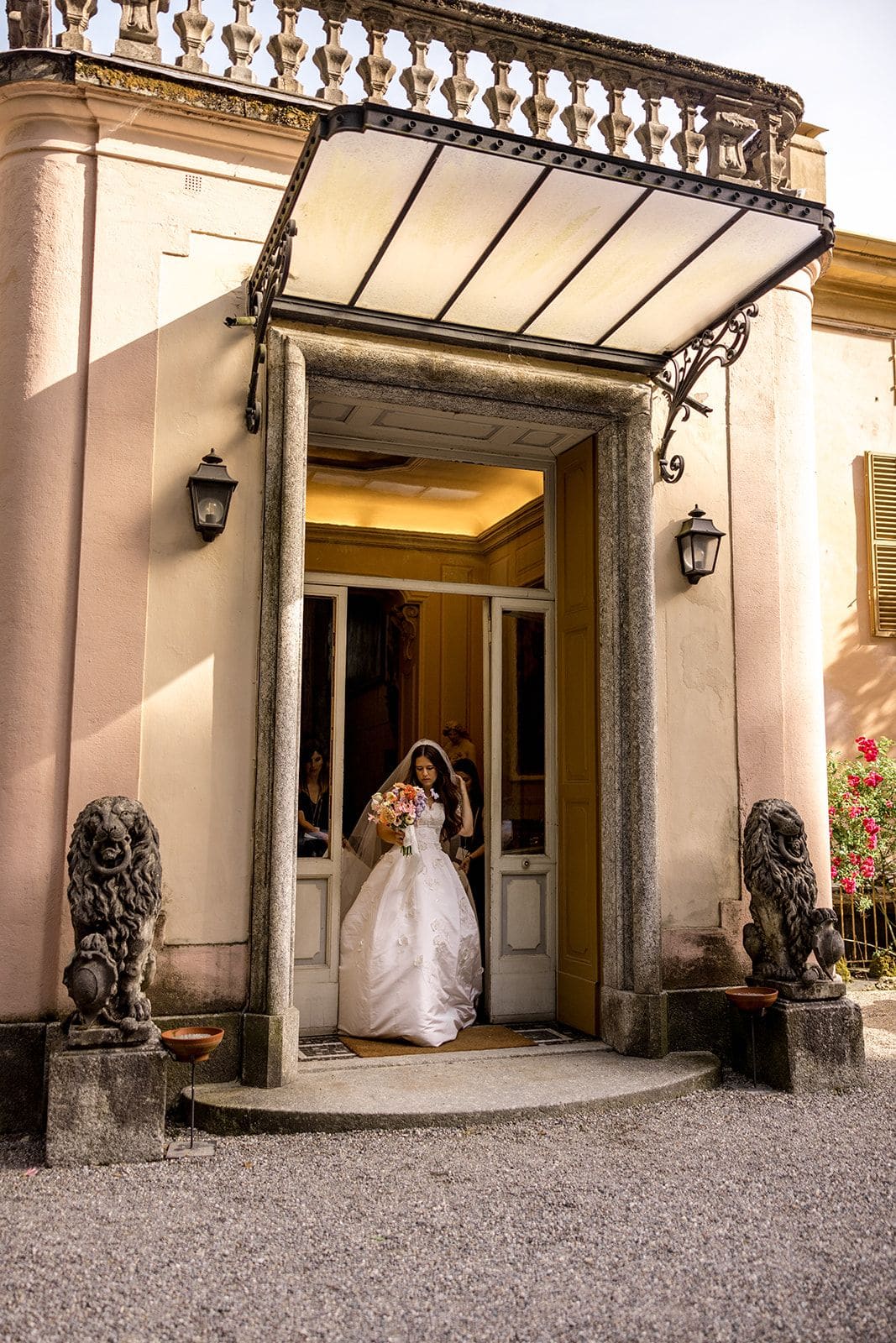 Bride emerges from Villa Pizzo