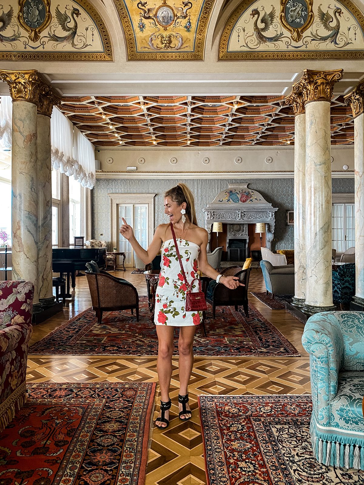 Woman standing inside Villa Serbelloni