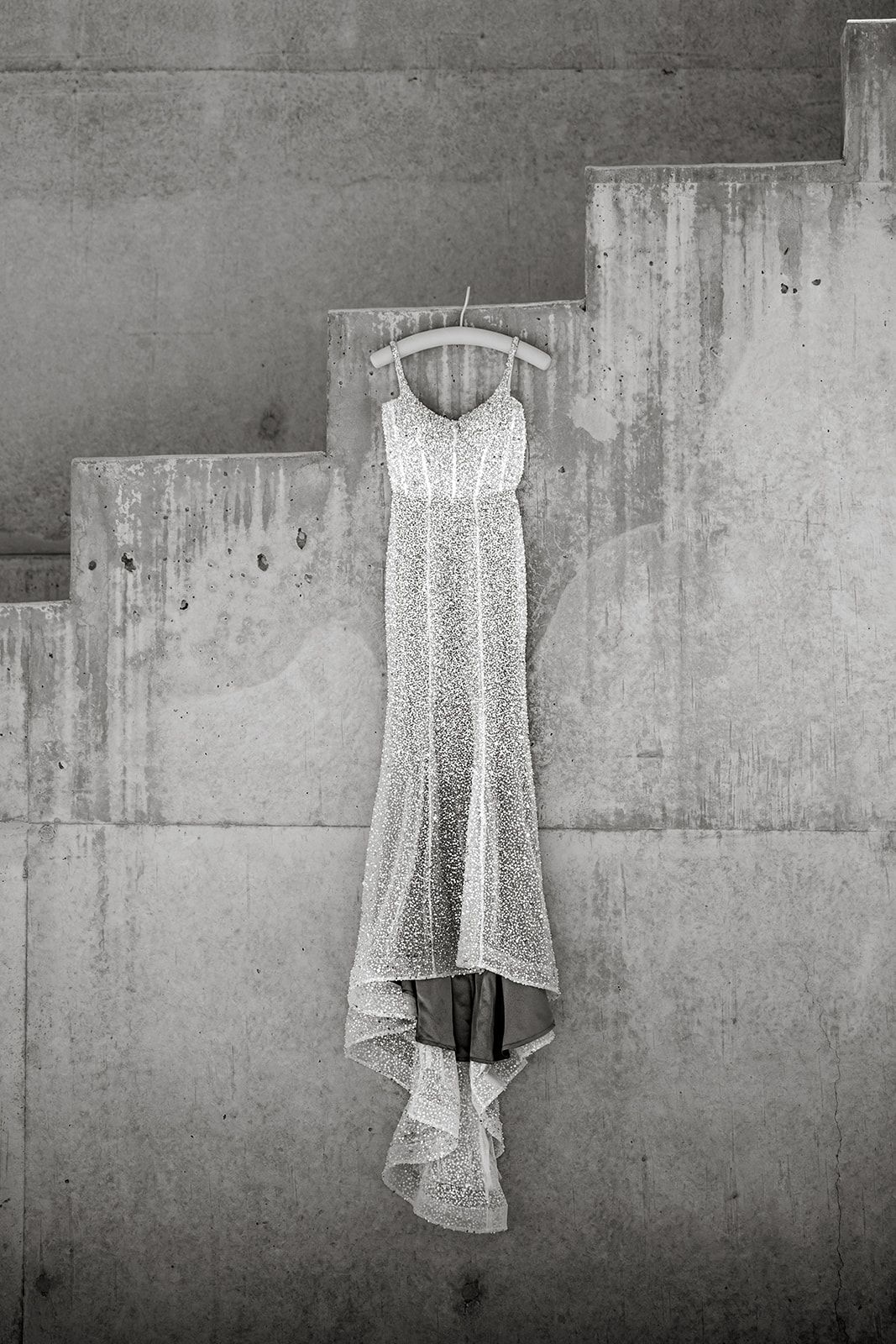Sparkling dress framed by Amangiri architecture