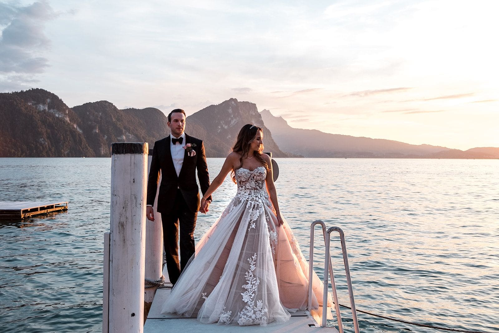 Bride and groom sunset portraits overlooking Lake Lucerne