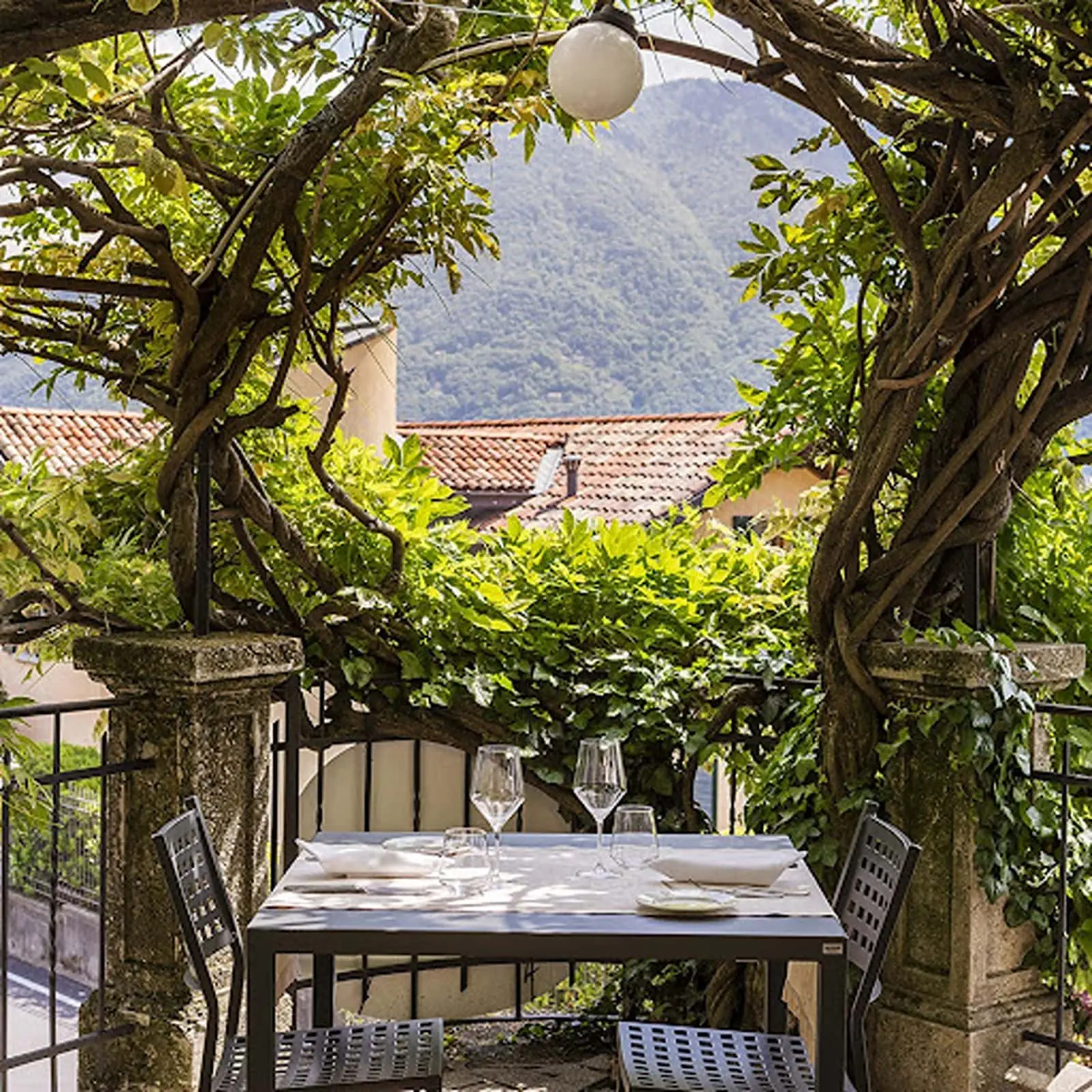 Outdoor seating area at Trattoria del Glicine in Lake Como