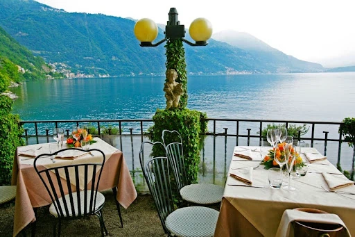 Outdoor terrace with a view of Lake Como from one of the best places to eat in Lake Como
