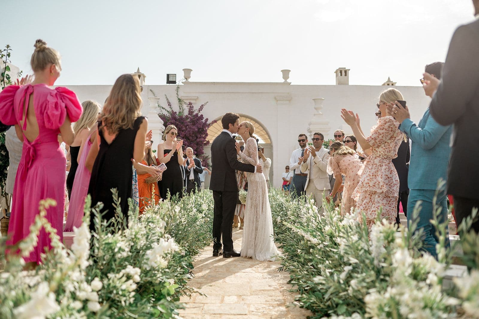 Bride groom kiss after ceremony at Masseria Potenti