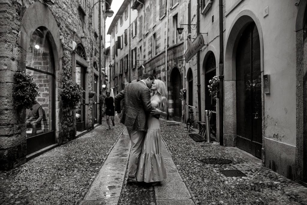 Couple in Lake Como have a session with local Lake Como engagement photographer after learning about the purpose of engagement photos