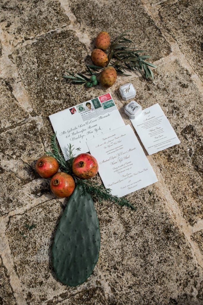 A Puglia, Italy inspired invitation suite styled with local cacti and olive branches. 