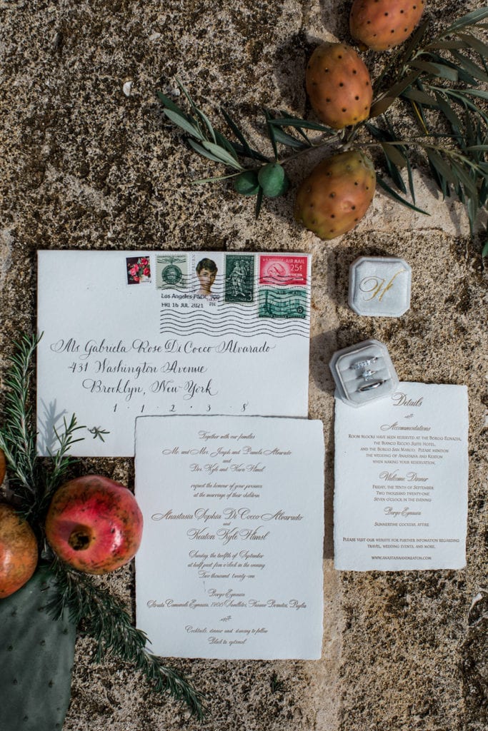 A Puglia, Italy inspired invitation suite styled with local cacti leaves and olive branches. 
