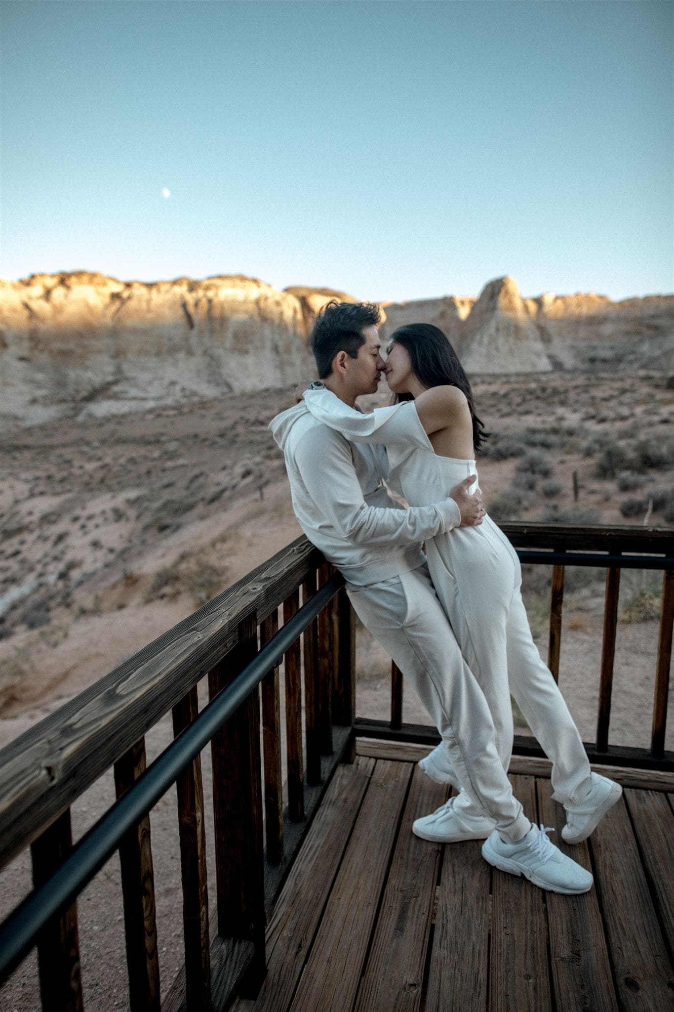 A couple pose together at Amangiri in Canyon Point, Utah for their Amangiri engagement photos.