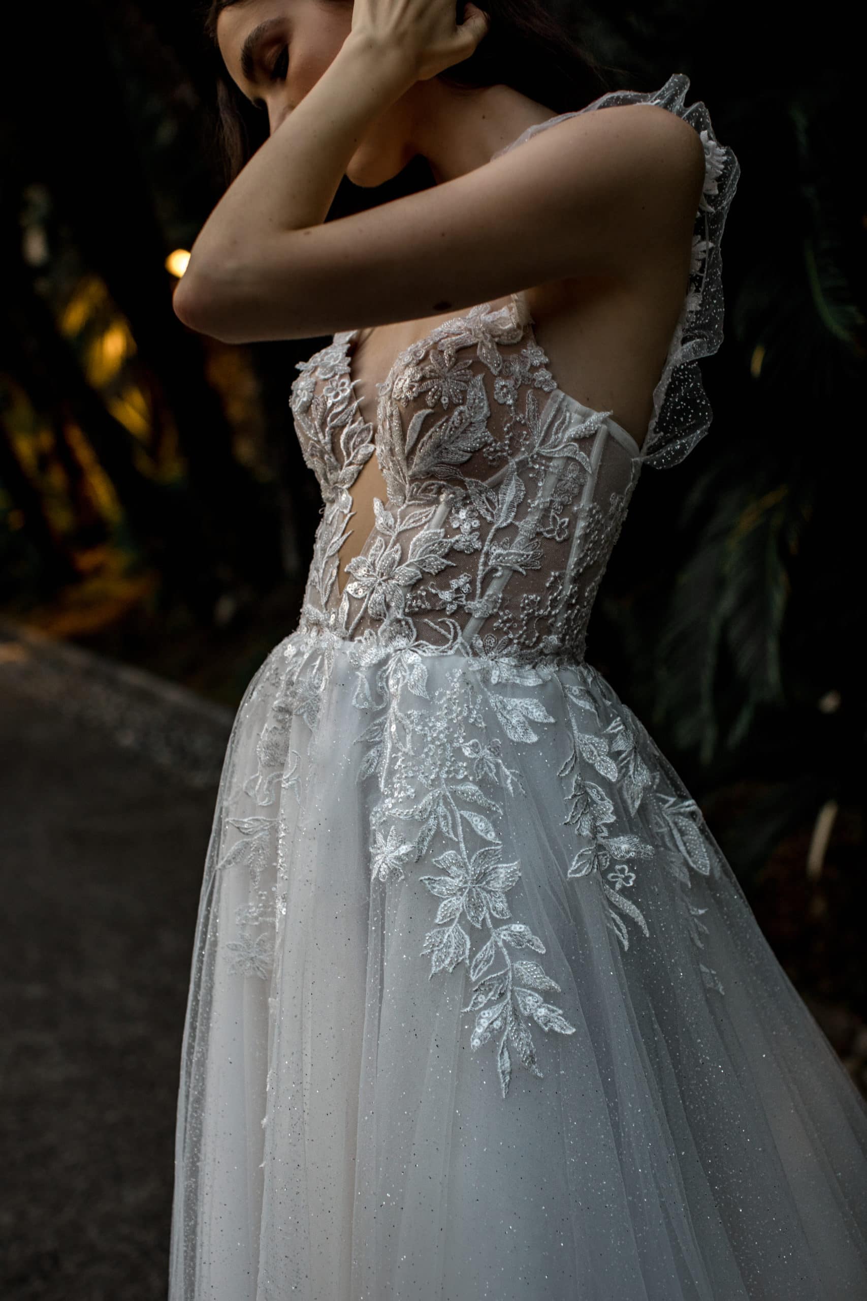 Lace beaded detail on wedding dress