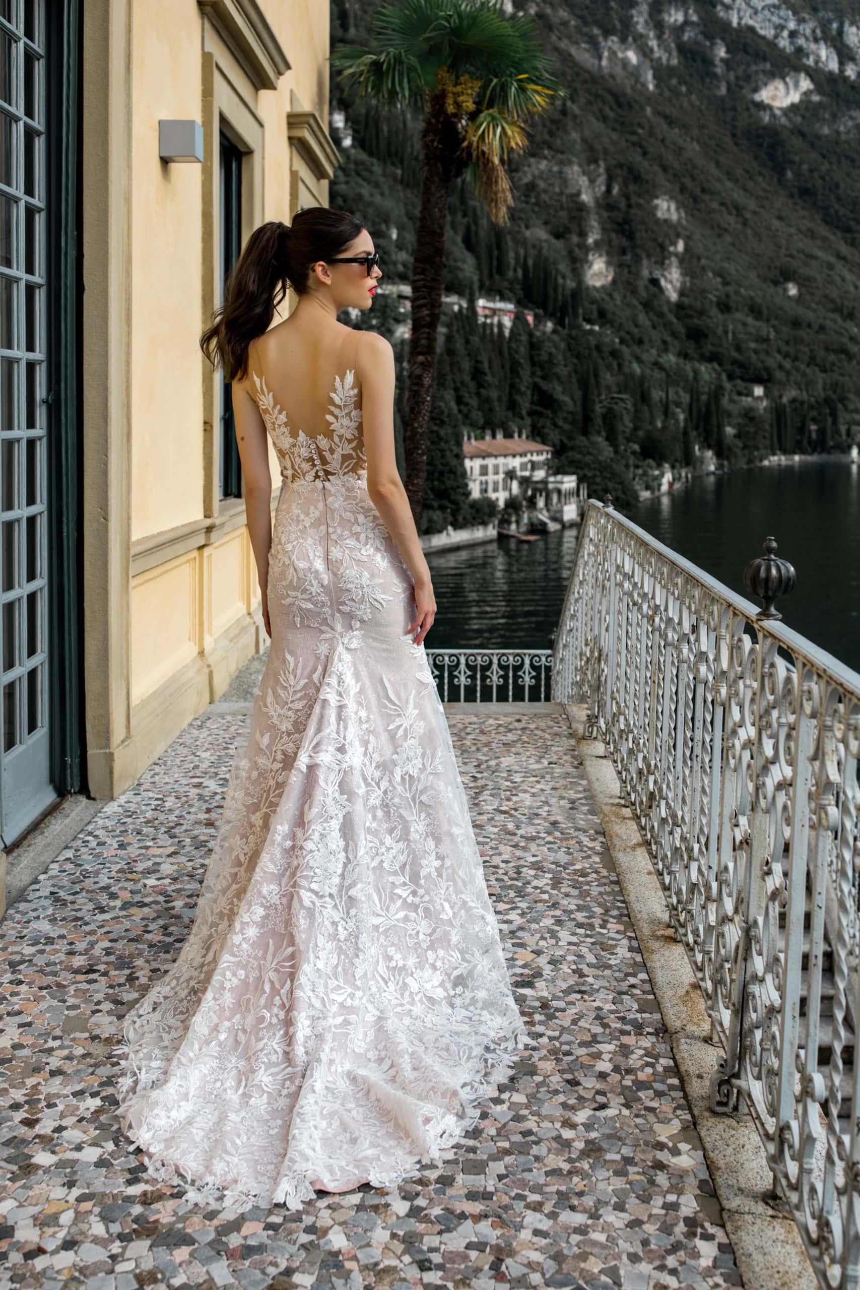 Model walks at Villa Cipressi wearing wedding dress