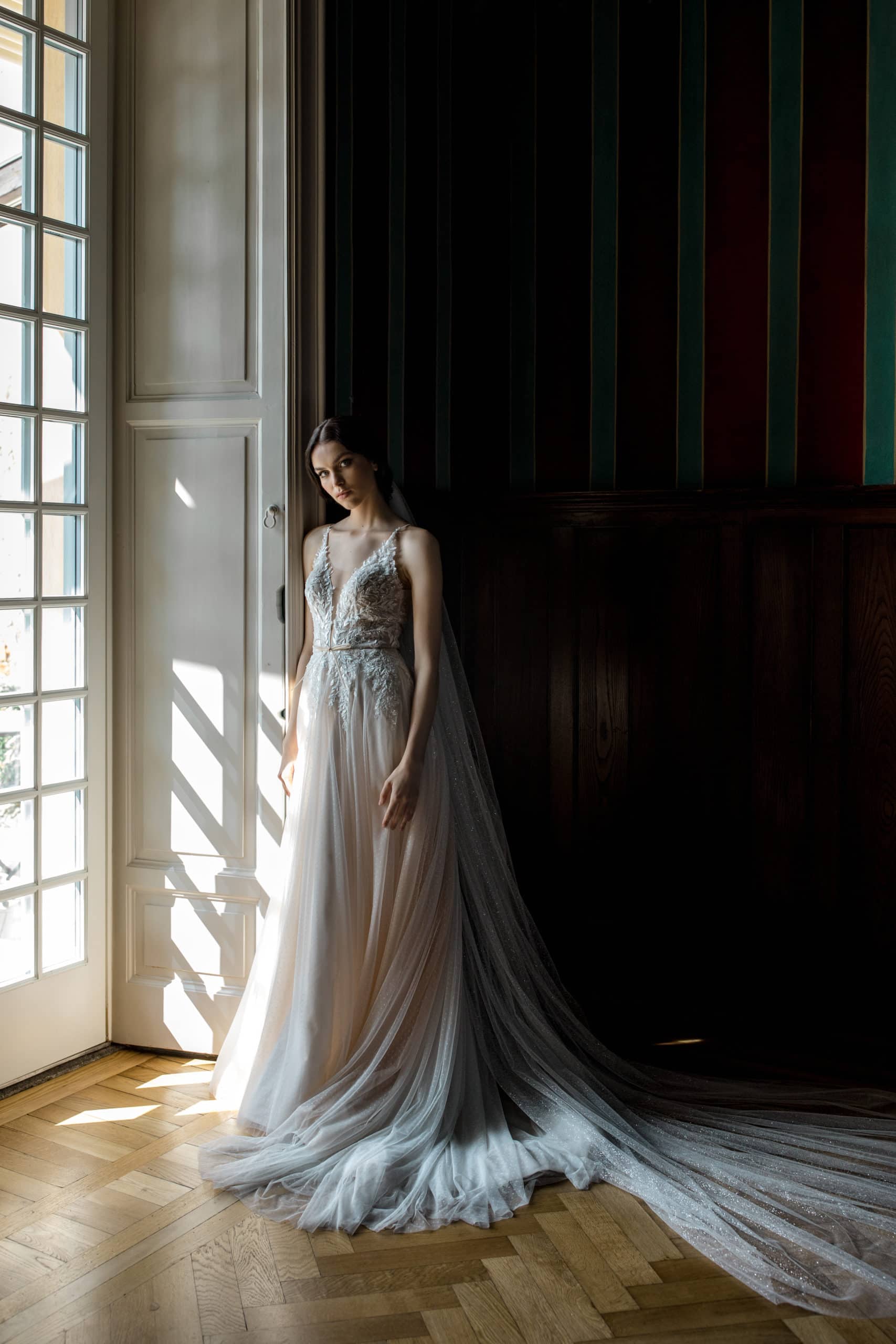 Model wears wedding gown inside Villa Cipressi