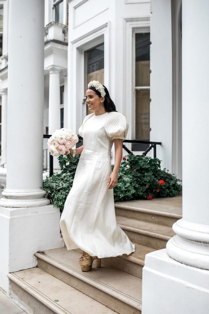 Bride steps out of London home in Gabriela Hearst wedding gown