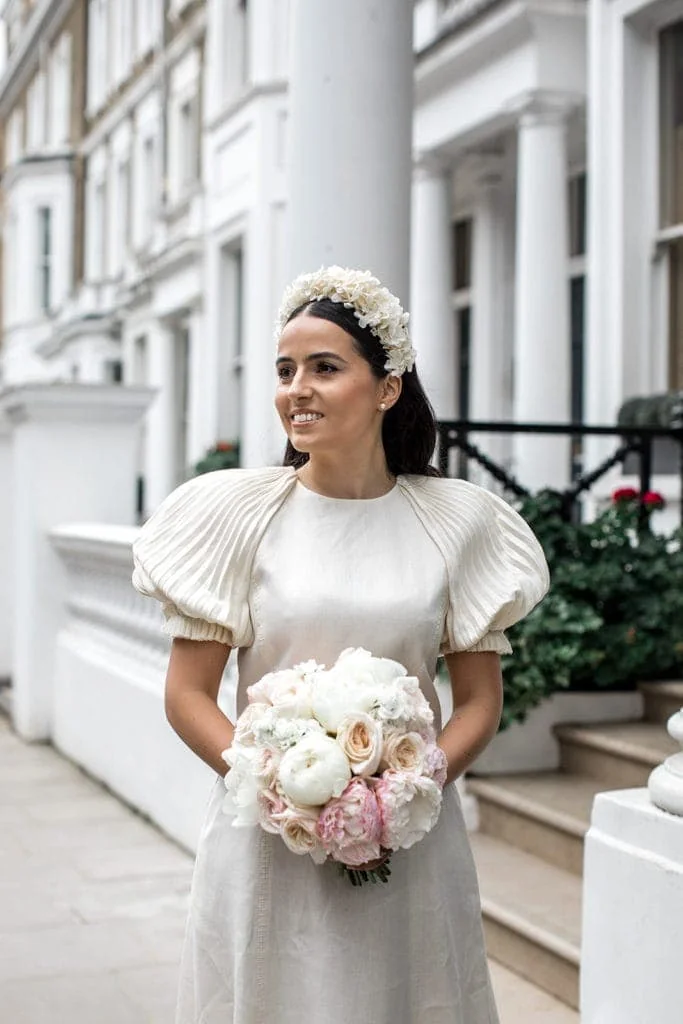 London bride carries pink and white peony bouquet