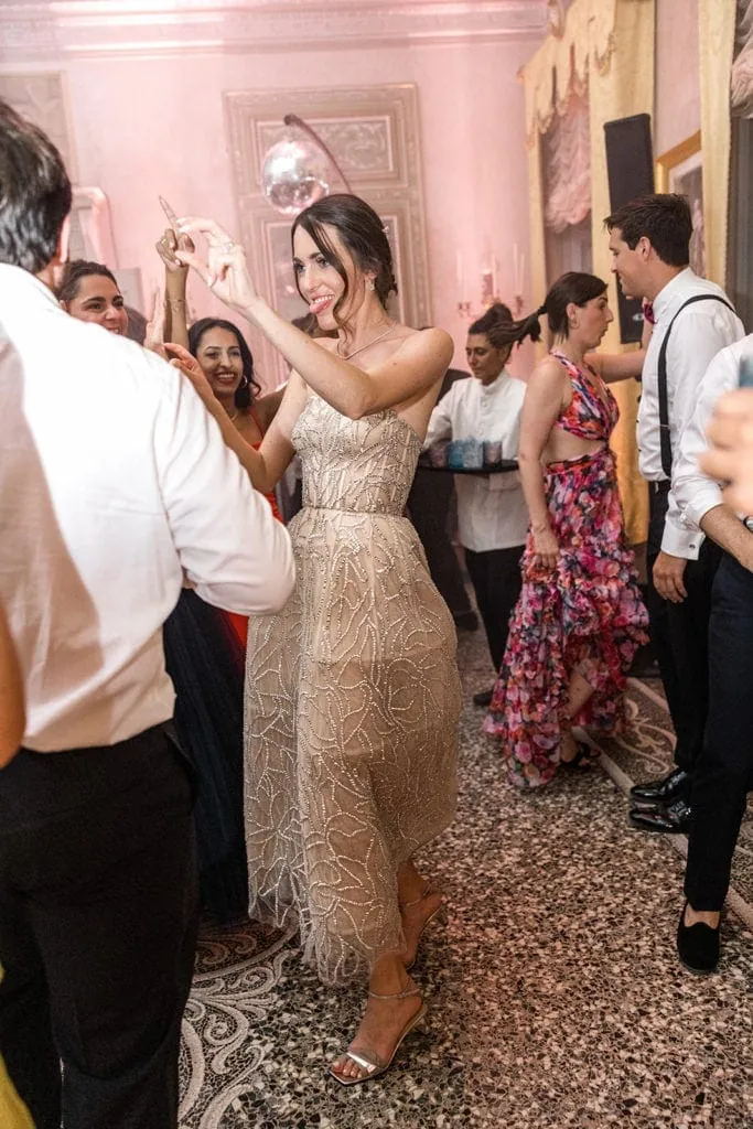 Bride dances at a Lake Como wedding villa in an Oscar de la Renta dress