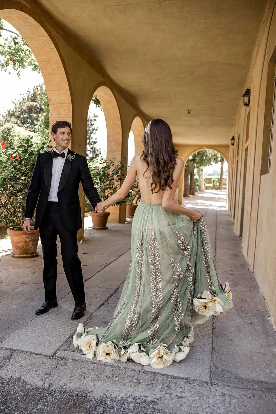 Bride and groom dance together before Villa Pizzo wedding