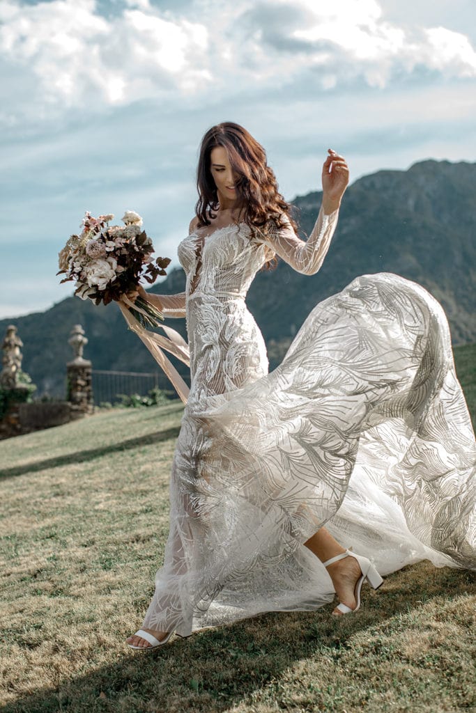 Bride models Millanova gown