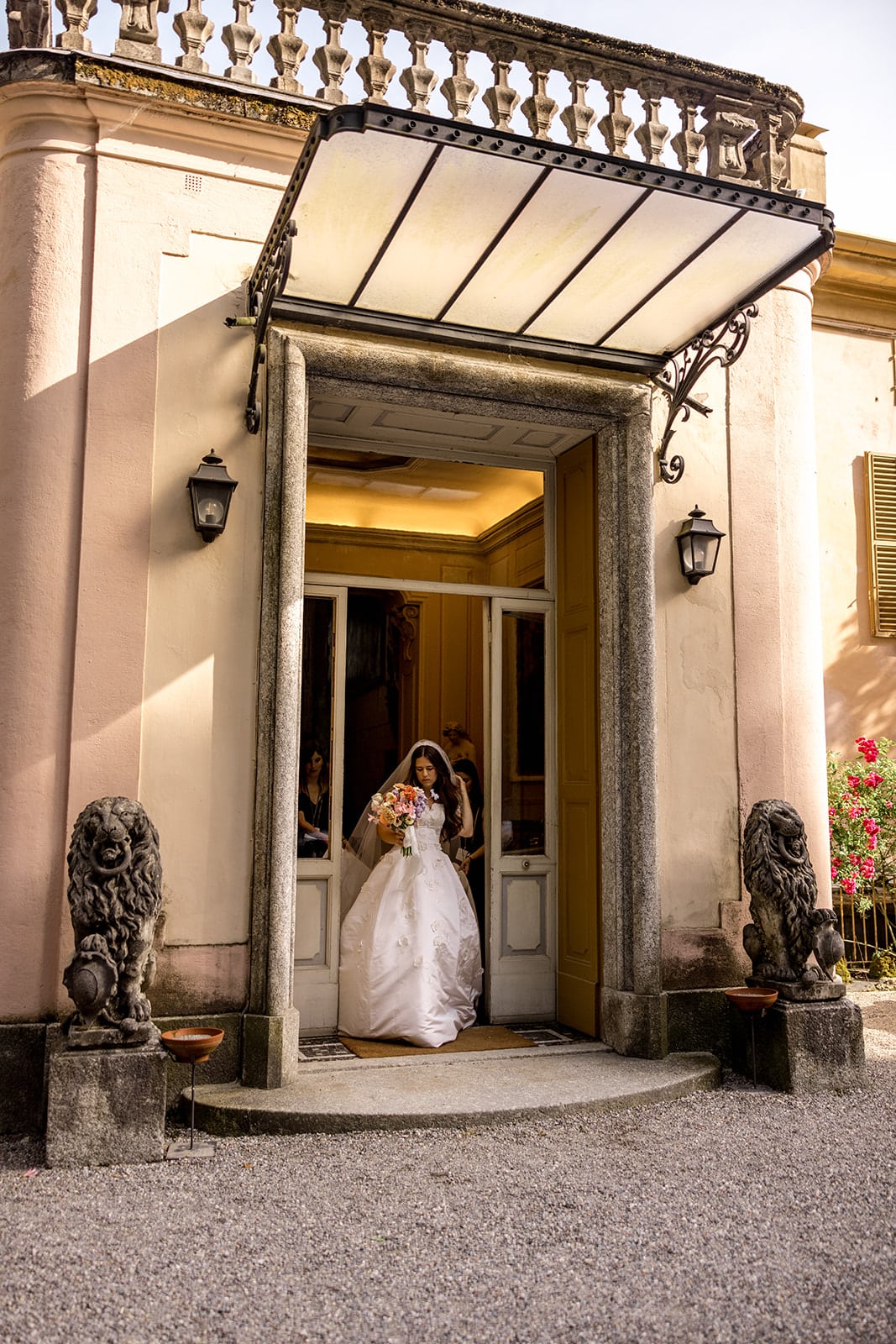 Bride emerges from Villa Pizzo, Lake Como for wedding ceremony