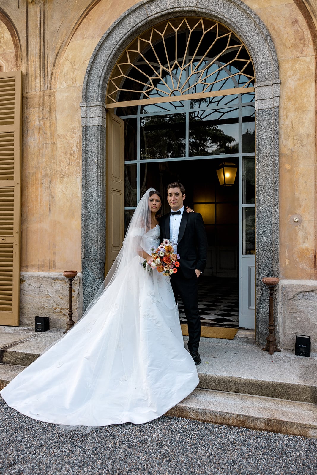 Bride and groom outside Villa Sola Cabiati