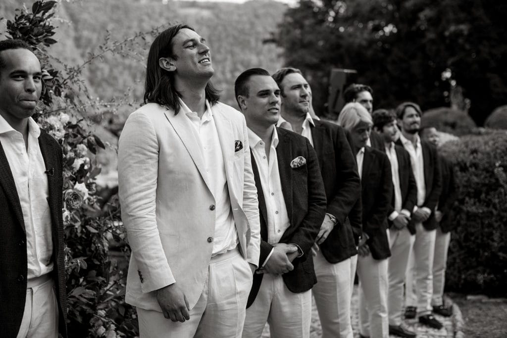 Groom sees bride first time during Lake Como destination wedding ceremony