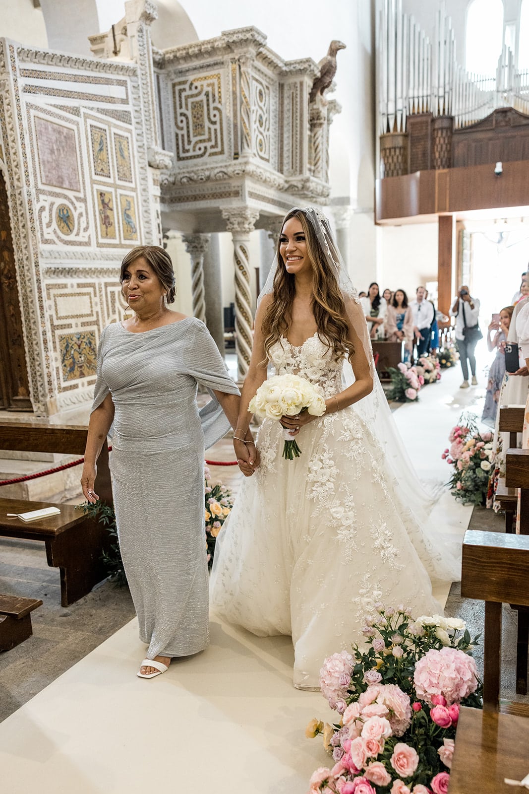 Mother and bride walk down aisle at Ravello wedding venue