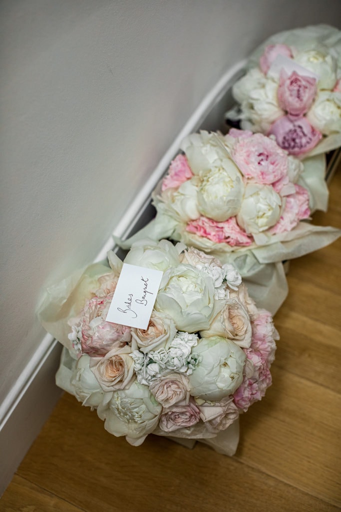 Bridesmaids' pink and white peony bouquets