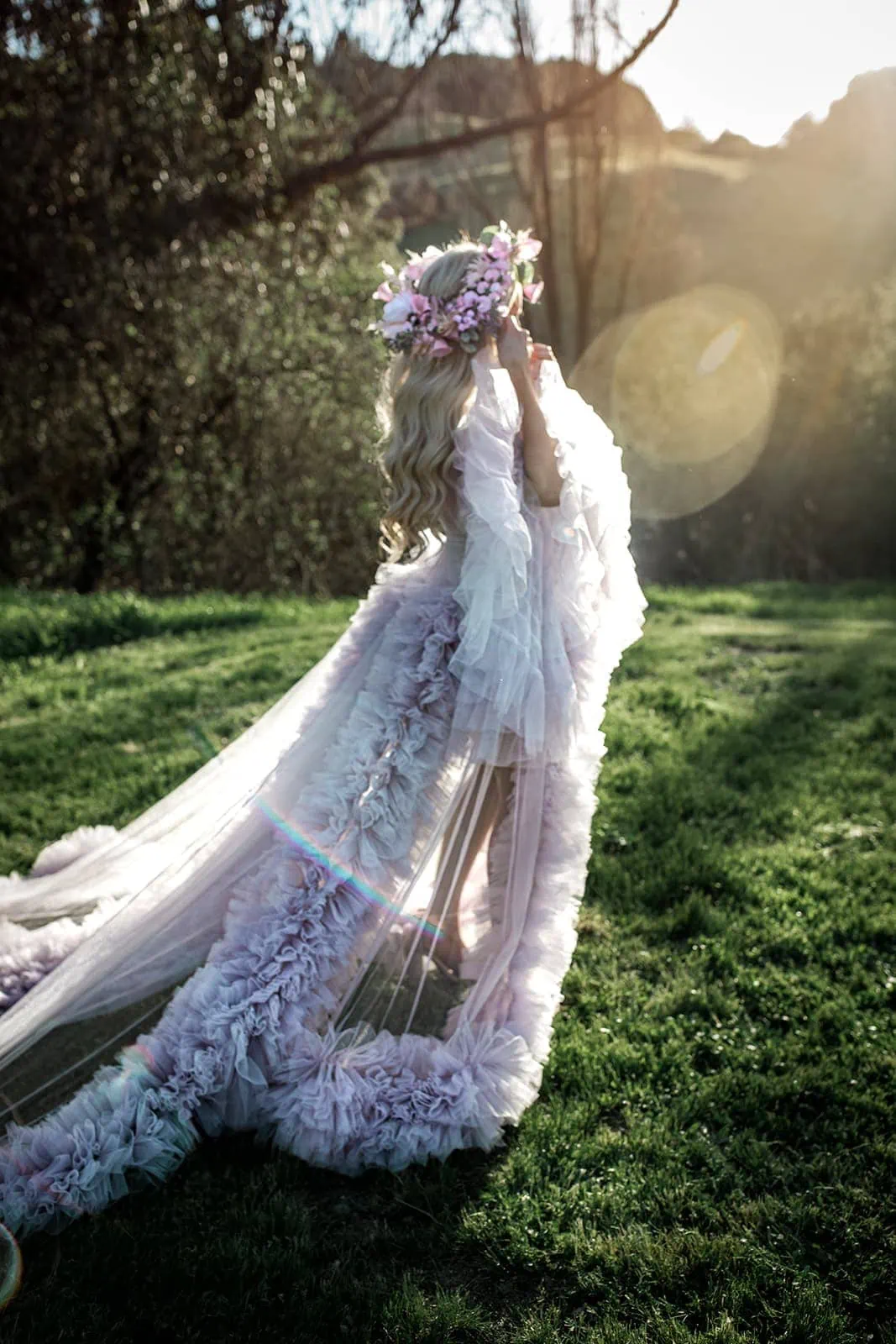 Model wears lavender luxury getting ready bridal robe