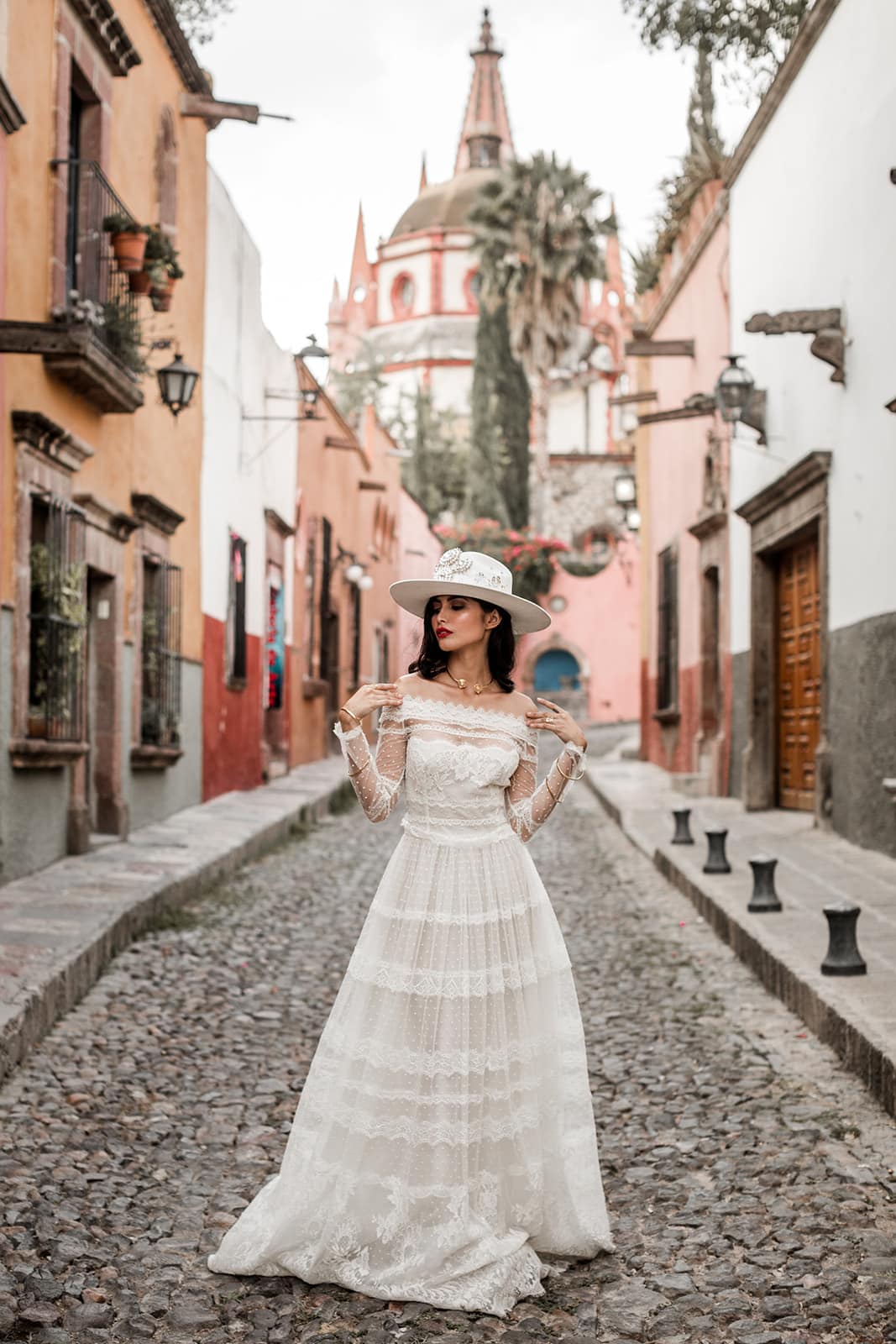 Bride stands in streets of San Miguel de Allende Mexico