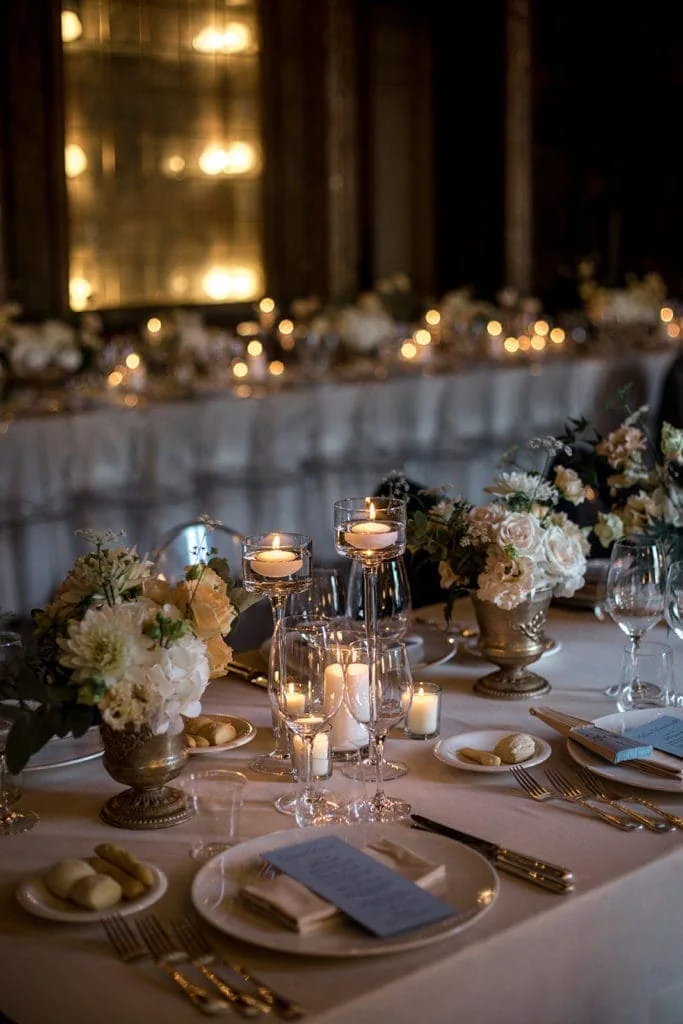Detailed reception table decor at wedding venue