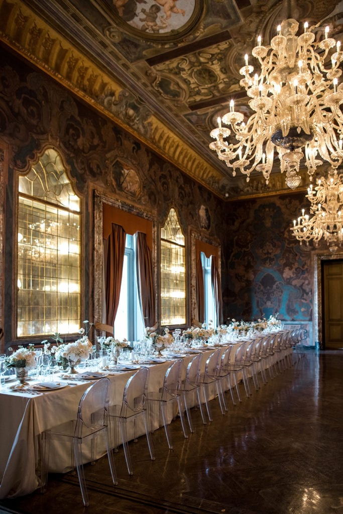 Reception site at Villa Erba with crystal chandeliers and ornate drapery