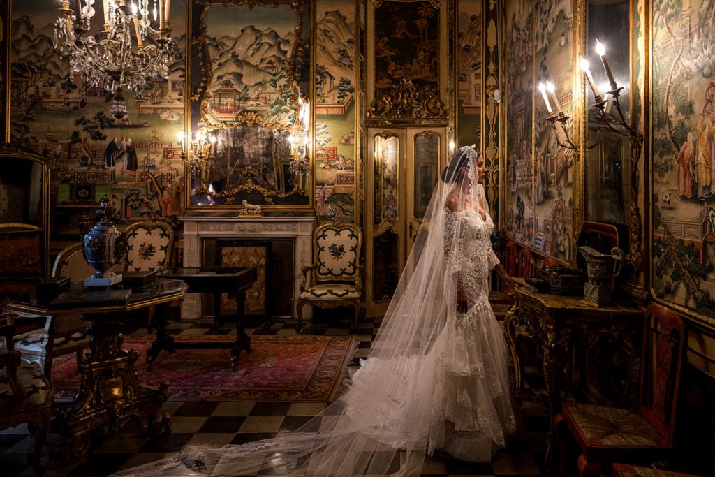 Bride stands for bridal portrait at Villa D'Orri, Sardinia wedding